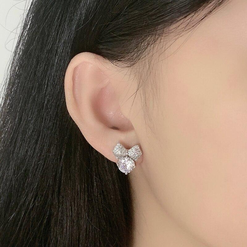 Selling Japanese ,Korean ,European American Personality Adorable Bow Zirconia Sterling Tone Earrings Trendy Stylish FemalePersonality