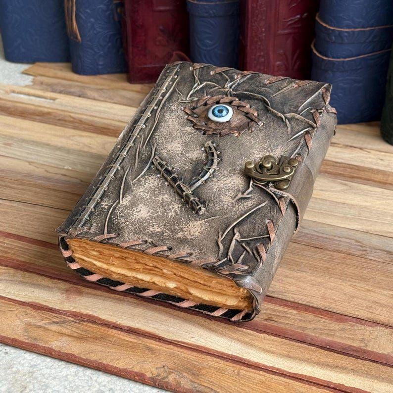 Handmade Leather Spellbook Journal - 7x5 Inch Fantasy Notebook with Eye Design, , Gothic Horror Grimoire, Evil Eye, Halloween