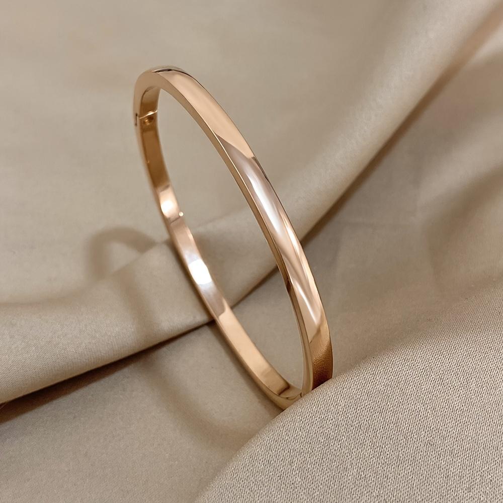 

Fashionable Minimalist - New Product - Waterproof and Rustproof - Titanium Steel - Golden Smooth Surface Bracelet