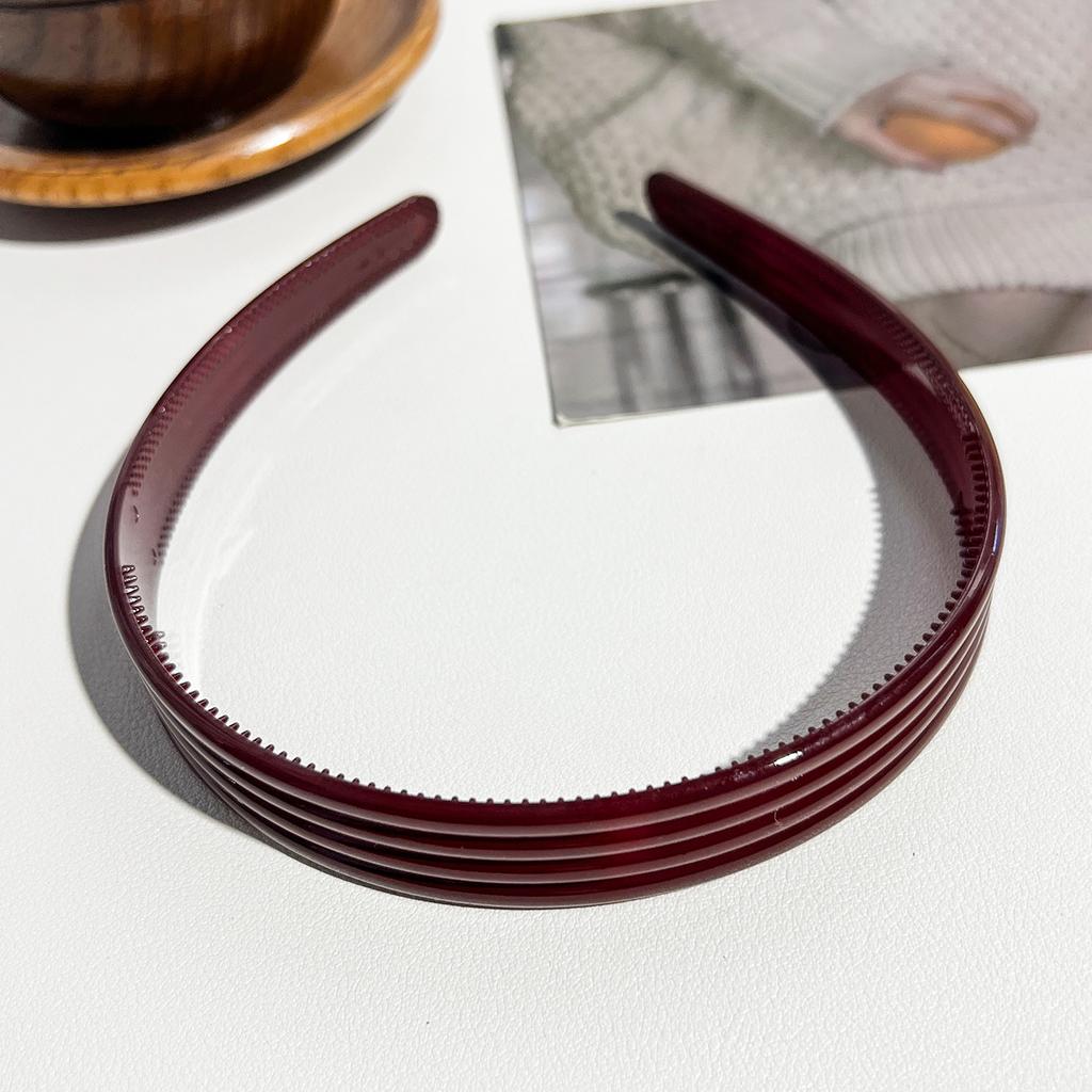 Korean retro striped glossy headband fashionable amber toothed non-slip headband PC advanced sense cranial top hairpin woman