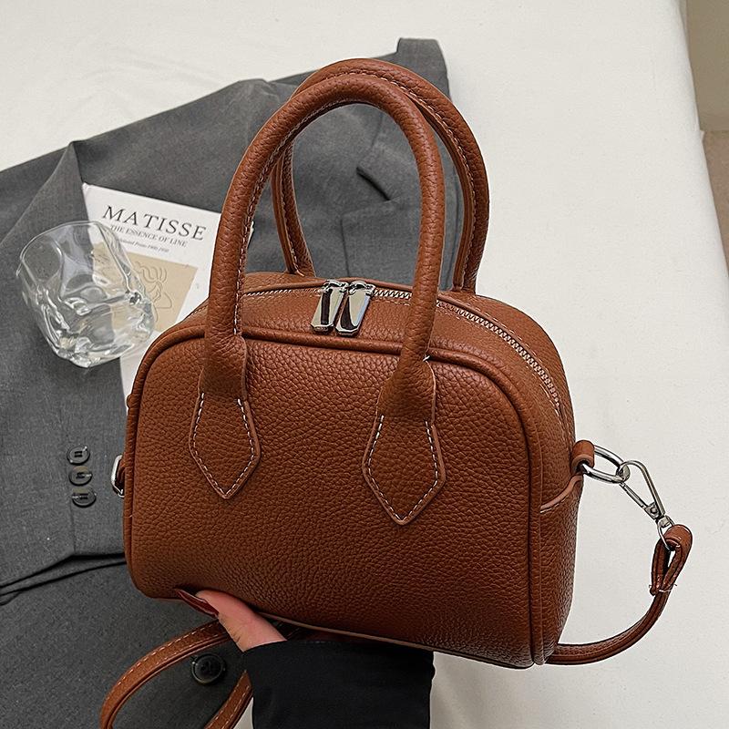 

Оптовая горячая распродажа корейская версия простой текстуры с узором личи портативная сумка-подушка женская повседневная сумка-мессенджер с темпераментом