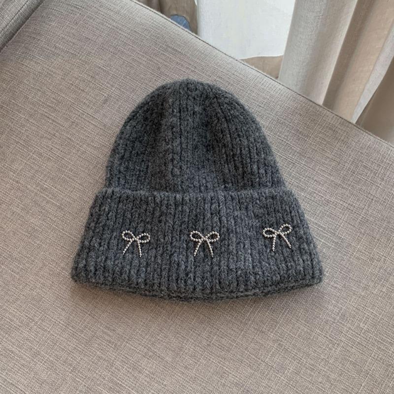 

Bow knitted wool hat autumn and winter new big head circumference versatile fashion ear protector cold hat women
