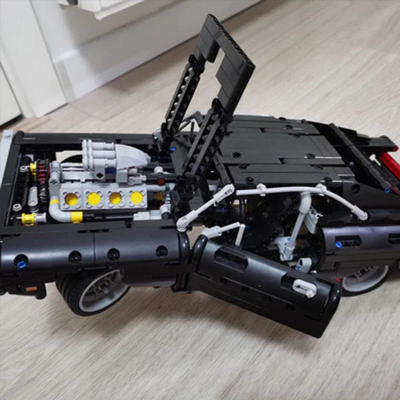 Juego de bloques de construcción mecánicos de 1077 piezas para carreras, juguetes educativos para niños, modelo para ensamblar, regalos para fiestas y Navidad.