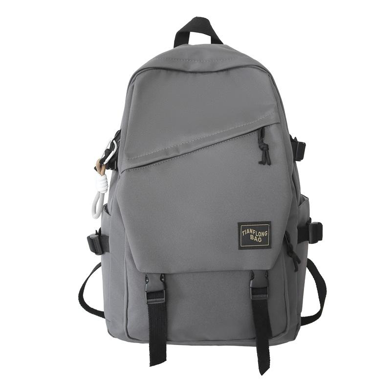 Schoolbag wholesale backpack trend simple outdoor couple backpack male large capacity junior high school high school college student schoolbag