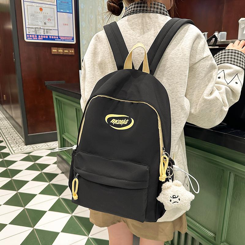 

Student schoolbag, girl junior high school student large-capacity backpack, male simple commuter high-value backpack new model