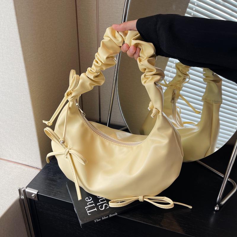 

ins niche design pleated shoulder strap bag 2025 new bow shoulder bag cloud bag female cute armpit bag жовтий