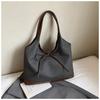 Retro commuter niche bow single shoulder armpit bag 2025 Korean version new fashion simple contrasting color tote bag