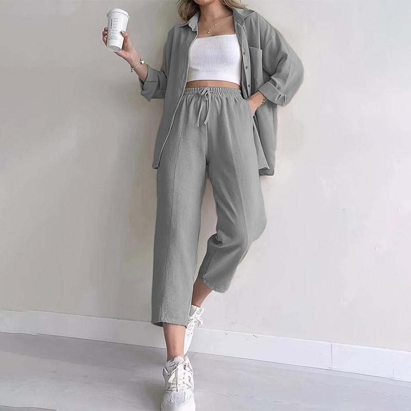 

Женский повседневный модный костюм-двойка осень 2025: Свободная рубашка с длинным рукавом и брюки длиной девять точек на шнуровке Small серый