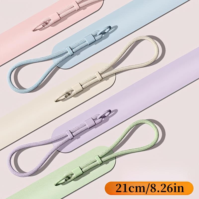 Universal phone wrist strap featuring anti-theft self-locking buckle. Durable anti-drop design, great for outdoor activities.