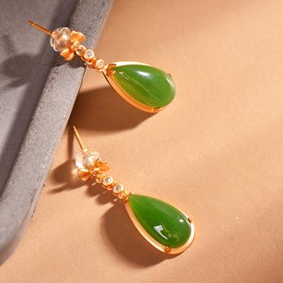 Klassische antike Goldhandwerkskunst eingelegte Schleife Kristall natürlicher Hotan-Jade Ohrringe für Frauen neu in lang kreativer Ohrhänger-Schmuck