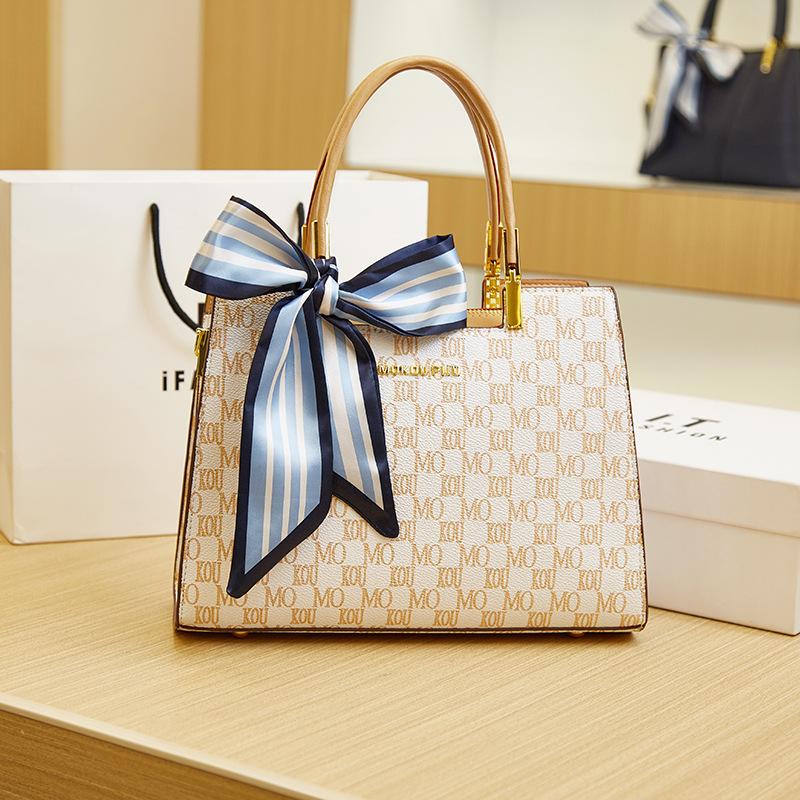 

New fashionable portable tote bag women s versatile large-capacity commuter bag retro printed shoulder women s bag