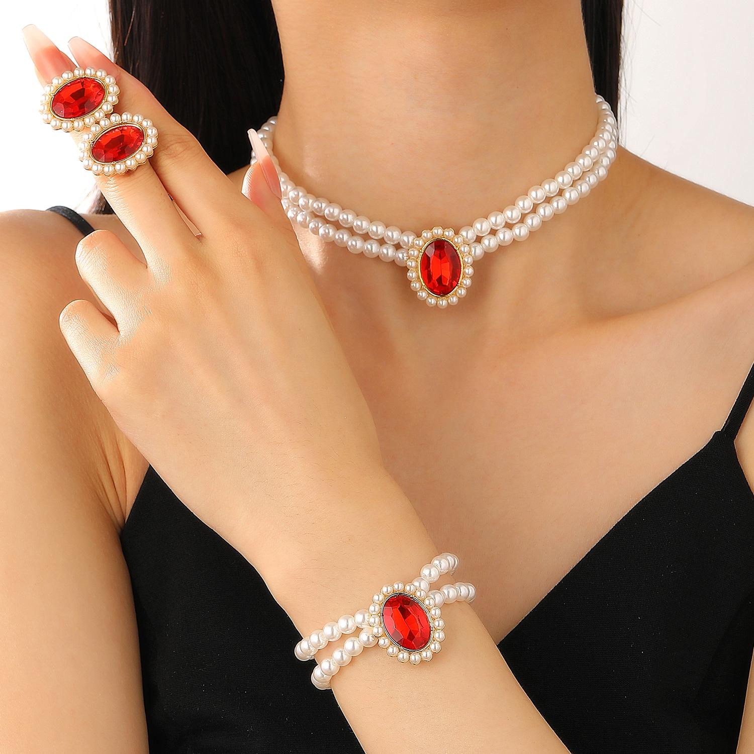 

Жіночий ювелірний набір високого класу в європейському та американському стилі: Двошаровий перловий чокер, намисто на ключицю, браслет та сережки