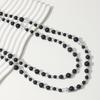 Elegant Retro Pearl Necklace: Women's High-End Light Luxury Sweater Chain.