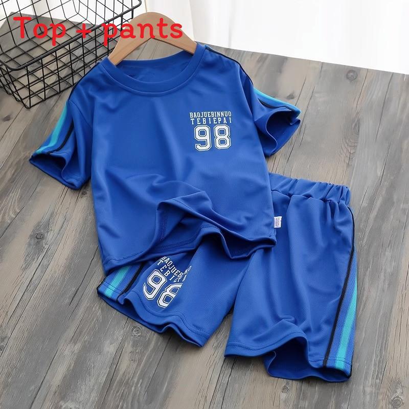 Kids Basketball Uniform Set With Polyester Fabric Short Sleeve Shorts For Summer Play