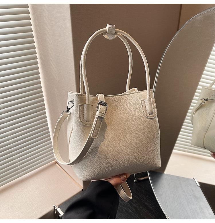 

Популярная портативная сумка-ведро женская 2025 новая весна и лето простая наплечная сумка повседневная дорожная сумка-мессенджер