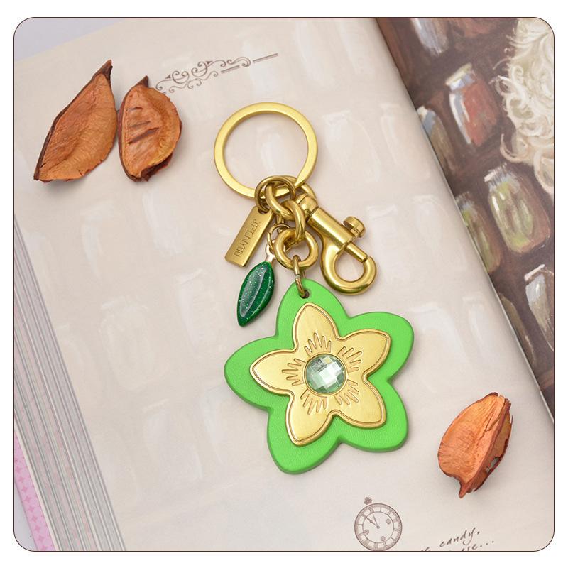 Marque de Luxe Sac Fleur Pendentif Mode Élégant Métal Cuir Créatif Exquis Polyvalent Mignon Accessoires Sac Porte-clés