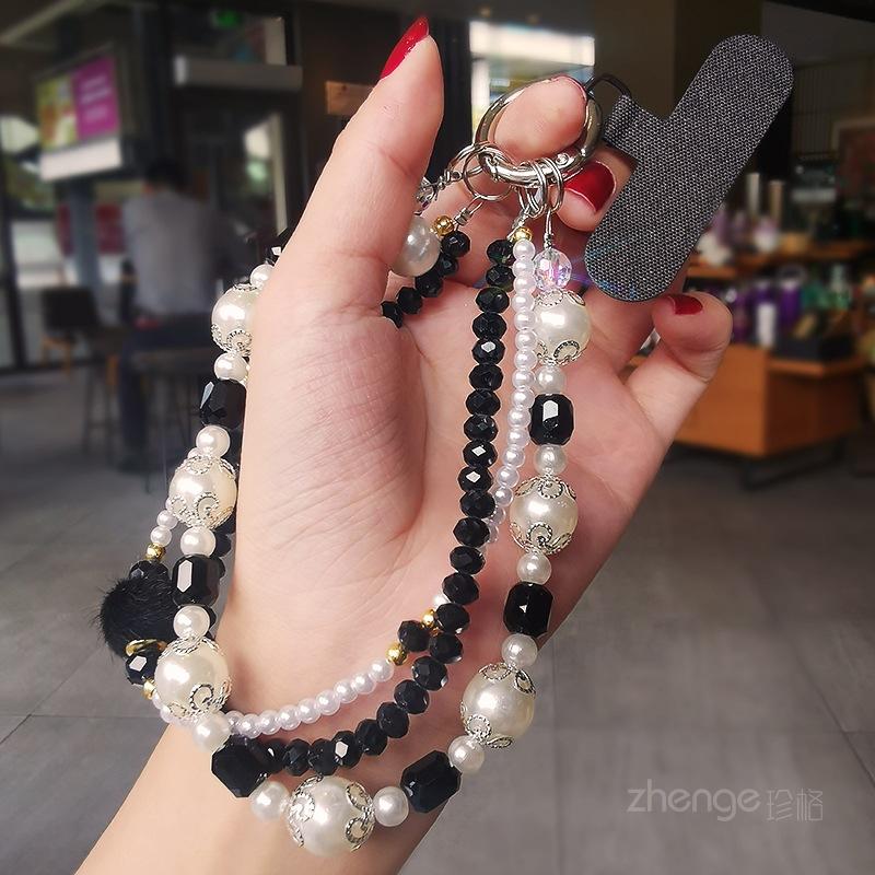 Perlen-Doppelketten-Lanyard-Armband Damen Ins-Mode Leichter Luxus Kleiner Duftiger Stil Handy-Ketten-Lanyard Kurzer Handgelenk-Anhänger