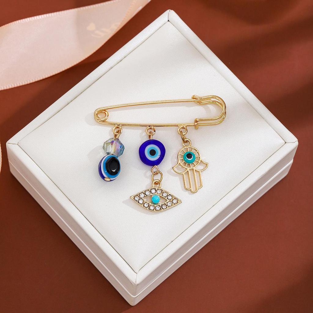 Creative Rhinestone Devil's Eye Tassel Brooch: Women's High-End Blue-Eyes Sweater Pin