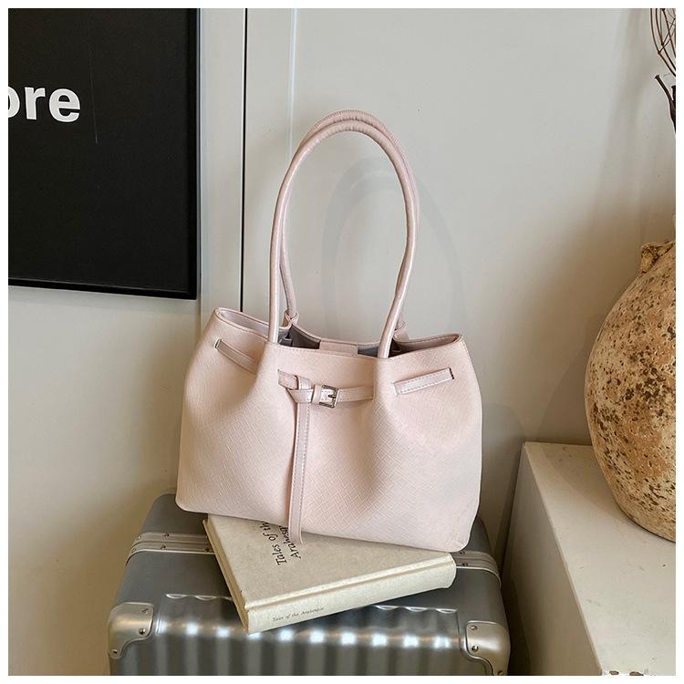 

Korean niche hand-held basket bag women s 2025 summer new large-capacity tote bag commuter shoulder armpit bag розовый