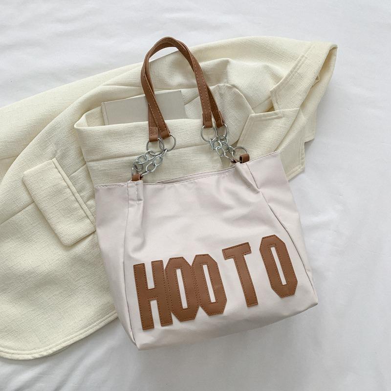 Simple shoulder bag women's new simple letters going out women commuting shopping large-capacity letter tote bag