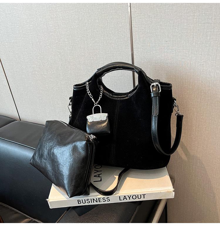 Retro suede portable bucket bag women's 2025 new fashion high-end sense child and mother bag commuter shoulder messenger bag