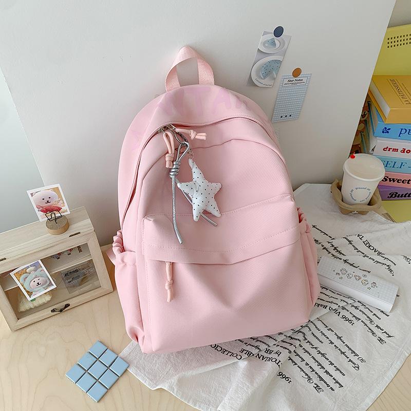 Schoolbag primary school students high value fresh ins Japanese backpack large capacity simple junior high school cute new casual backpack