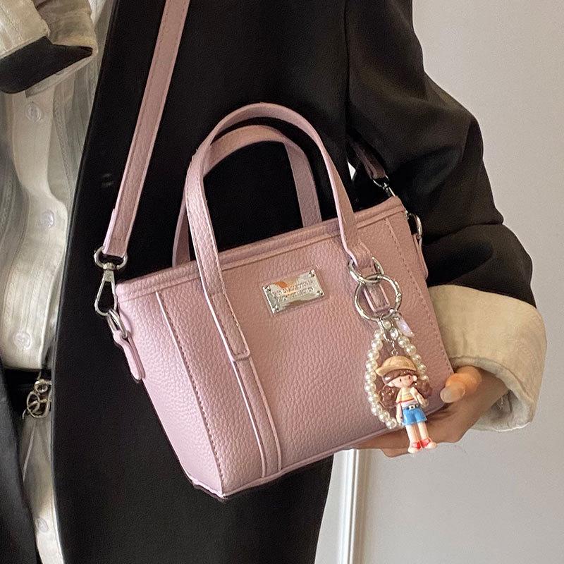 Spring hot sale lychee pattern high-end portable bucket bag Korean version casual small fresh temperament versatile messenger women's bag