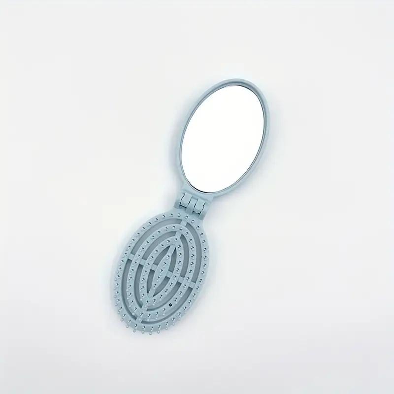 

Portable Folding Hair Comb with Mirror, Lightweight & Travel-Friendly for On-the-Go Styling. A Perfect Gift for Women & Girls. синій