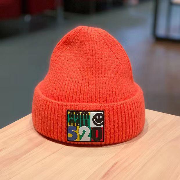 Student Wollmütze Koreanische Version Herbst und Winter Mode warm Buchstabenstickerei Strickmütze Damen süß cool Wind Winter Ohrenschutz Kältemütze