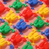 90er-Jahre-Nostalgie: Kleines Hüpfendes Plastikfrosch Spielzeug - Klassischer Retro Hüpfender Frosch für Kinder