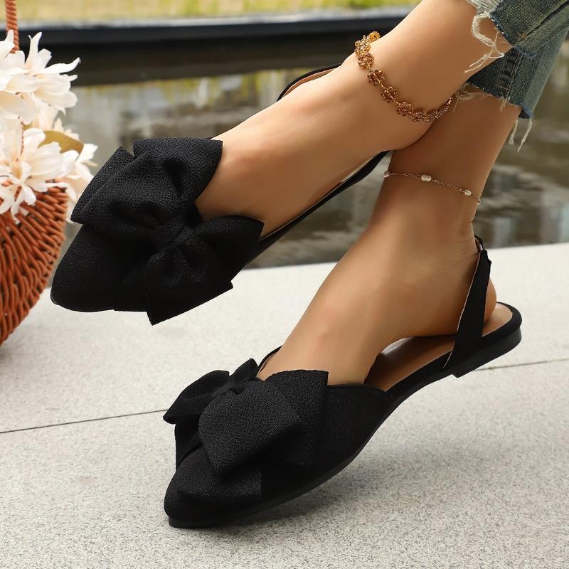 Summer flat-bottomed bow bag head sandals new European and American large-size pointed back empty sandals women