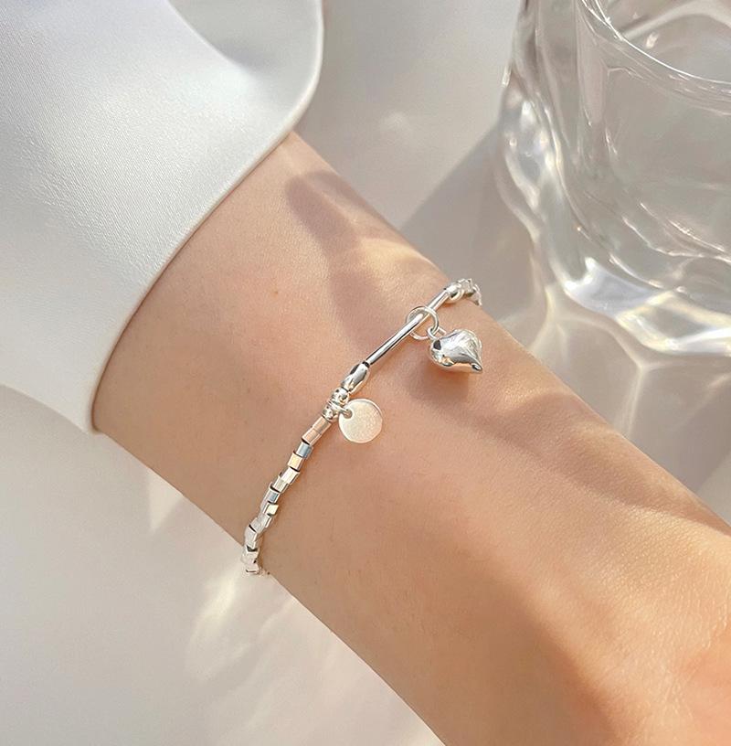 

Жіночий браслет Sweet Heart з двошаровим порожнистим серцем та намистинами copper