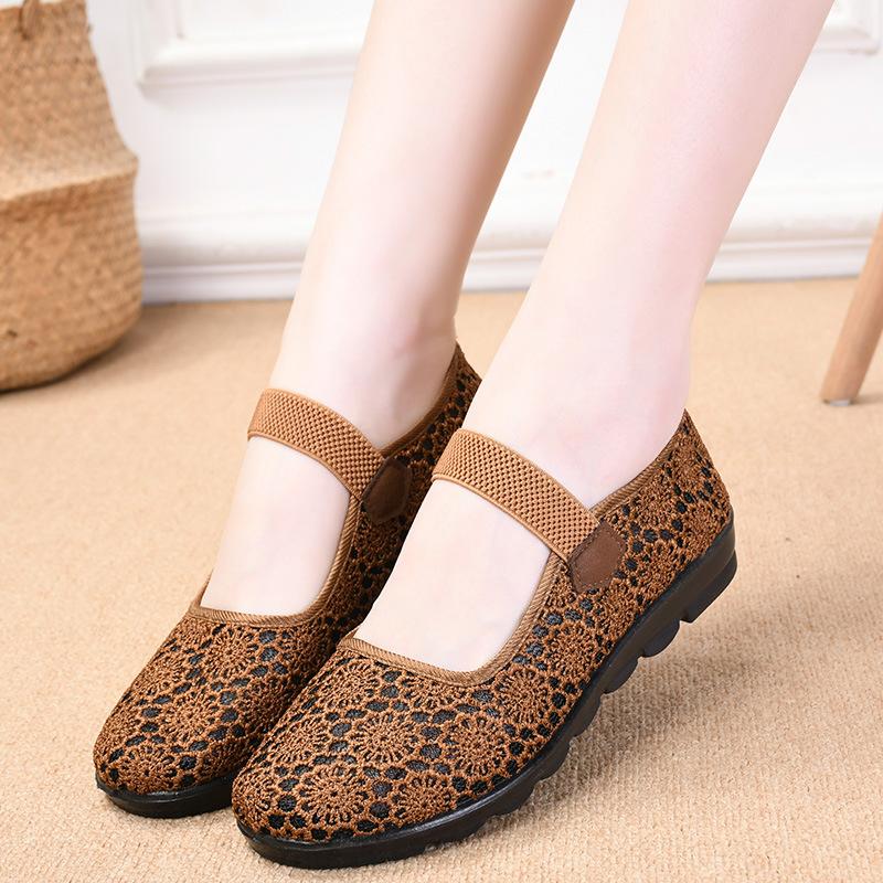 Summer new cloth shoes women's flying woven hollow breathable medium and old soft sole one pedal casual shoes