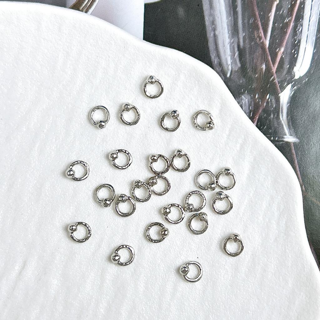 Legierung Gebogener Stab Augenbrauenstecker Außengewinde Doppelseitig Vergoldet Spitzkegel Punk Style Nagelkunst Zubehör DIY Nagel Süß Cool Dekoration DIY