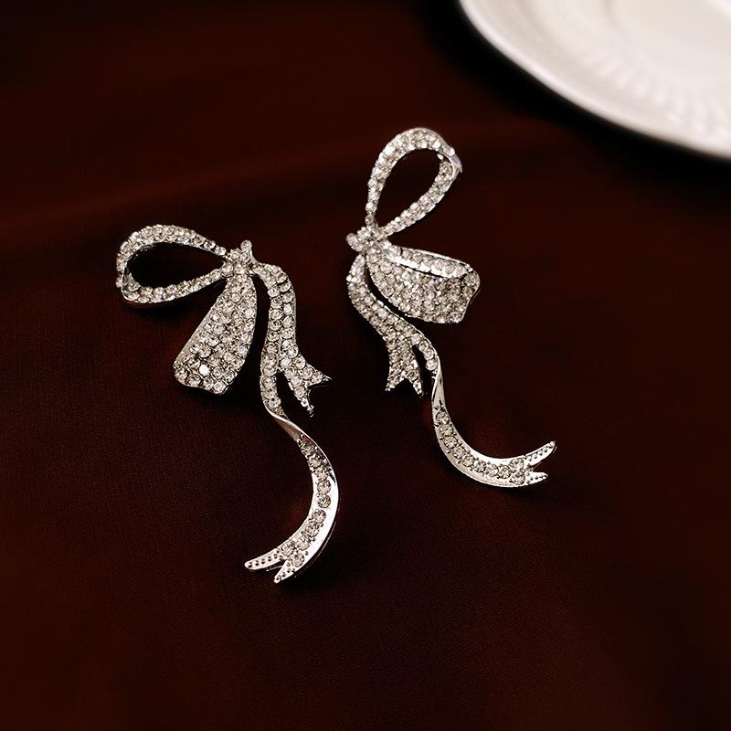 

Elegant Diamond-Studded Bow Ribbon Silver Earrings for Women