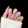 Handmade Medium-Length Pink Ice Translucent Nail Tips with Cute Bow French Design