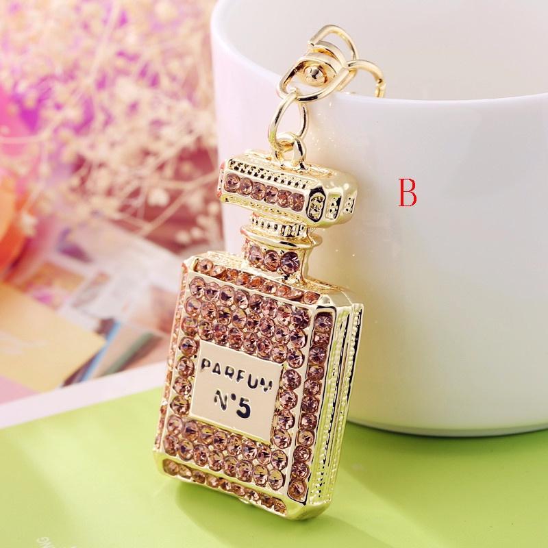 Portachiavi con pendente per borsa da donna con fibbia per chiave per auto con bottiglia di profumo con diamante adorabile