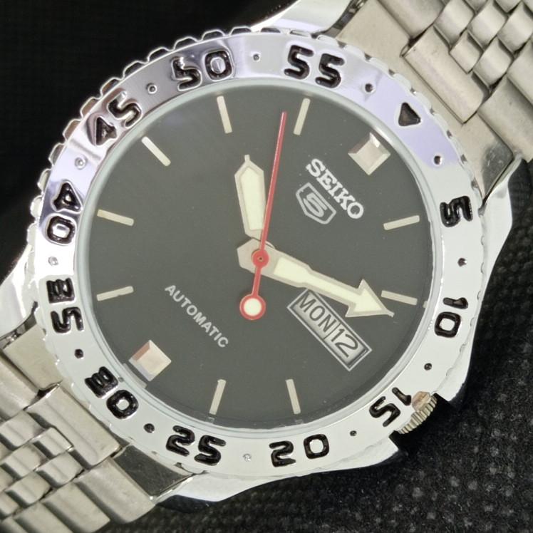 

REFURBISHED VINTAGE SEIKO 5 AUTO JAPAN MENS ARABIC BLACK WATCH 587c-a308920-9 SKU587c-a308920