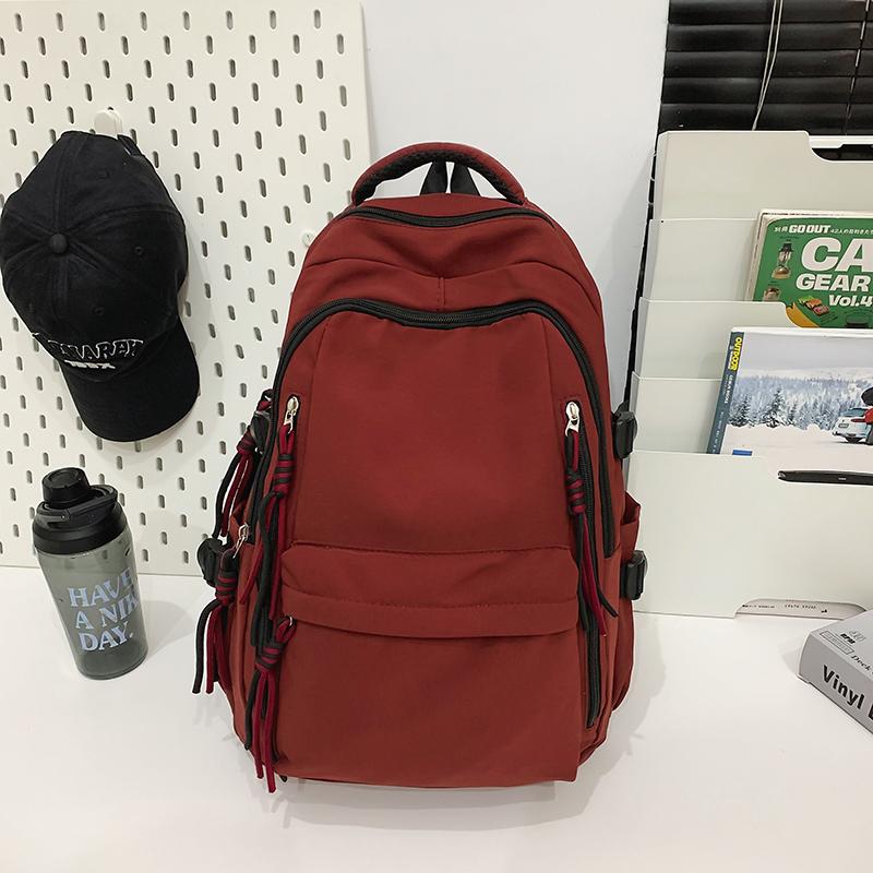 Ryggsäck för män i enfärgat utförande Ryggsäck för kvinnor med flera fickor Stor kapacitet Student Skolväska