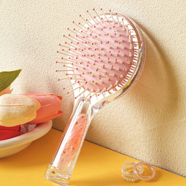 Hairbrush With Built-In Hair Tie