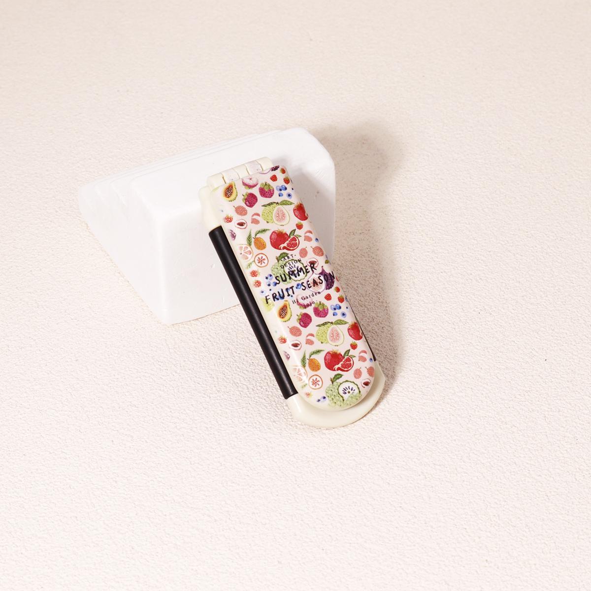 

A portable folding mirror comb with various fruit pattern designs, nylon brush air cushion comb,Special for real hair wigs