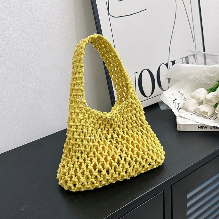 Ausgehöhlte Netzbeutel Handtasche Handgewebte Baumwollseil Tasche Handgelenktasche Strandurlaub Eimertasche