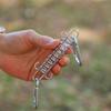 Outdoor Camping Tent Spring Wind Rope Hook Durable Metal Spring Hook with Tent Peg for Windproof Shelter Canopy Secure Anchoring