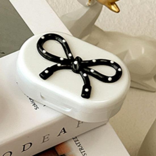 Bonbonfarbene Kontaktlinsenbox Niedliche Schleife Tragbarer Kontaktlinsenbehälter mit Pinzette Saugstab Set für Reise-Kit-Halter