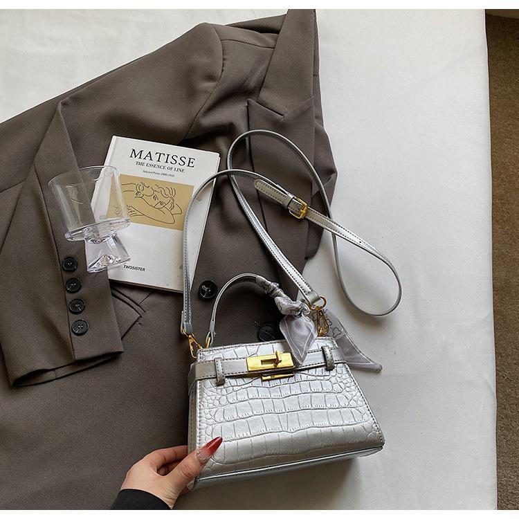 

Portable Kelly Bag 2025 Spring New Premium Textured Crocodile Ribbon Platinum Bag Temperament Shoulder Crossbody Bag срібний