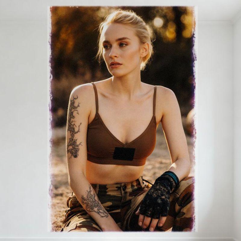 

Sexy Blonde Woman Low Bun Natural Sunlit Vintage Tin Sign, Brown Bralette Camo Pants Tattooed Arm Wall Decor for Bar Pub Home Ca 20x30cm（7.8x11.8inch）