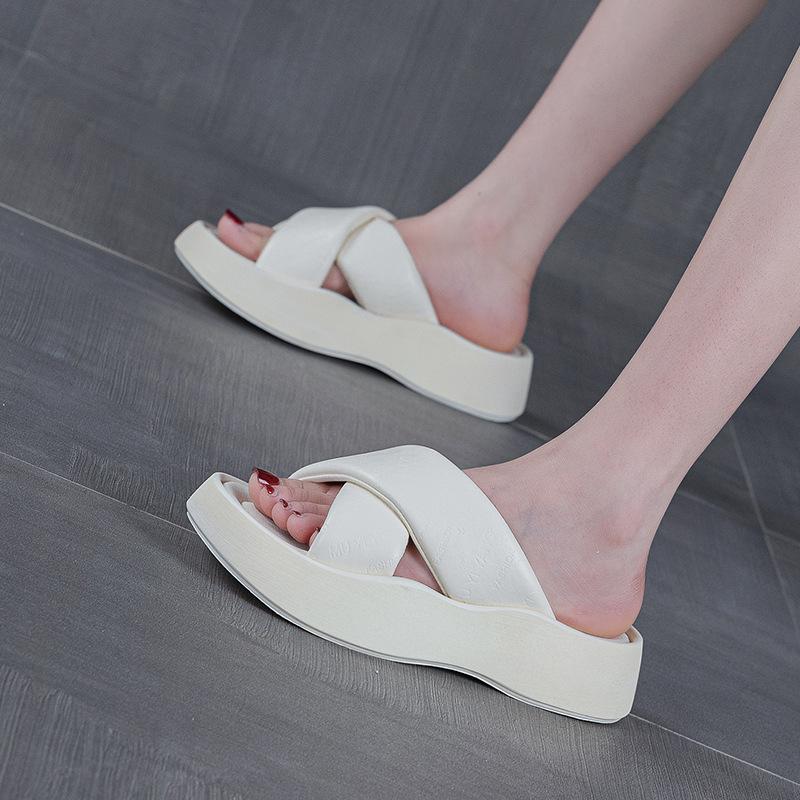 Thick-bottomed bread casual one-word slippers for women's outer wear summer new heightening fashion beach cool slippers