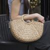 Bolsa de palha feminina moda nova primavera e verão lazer férias portátil bolsa de praia bolsa de papel trançado semi-redonda feita à mão