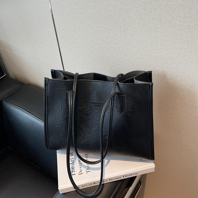 

Autumn and winter new tote bag women s niche shoulder bag handbag large-capacity casual versatile commuter bag чорний