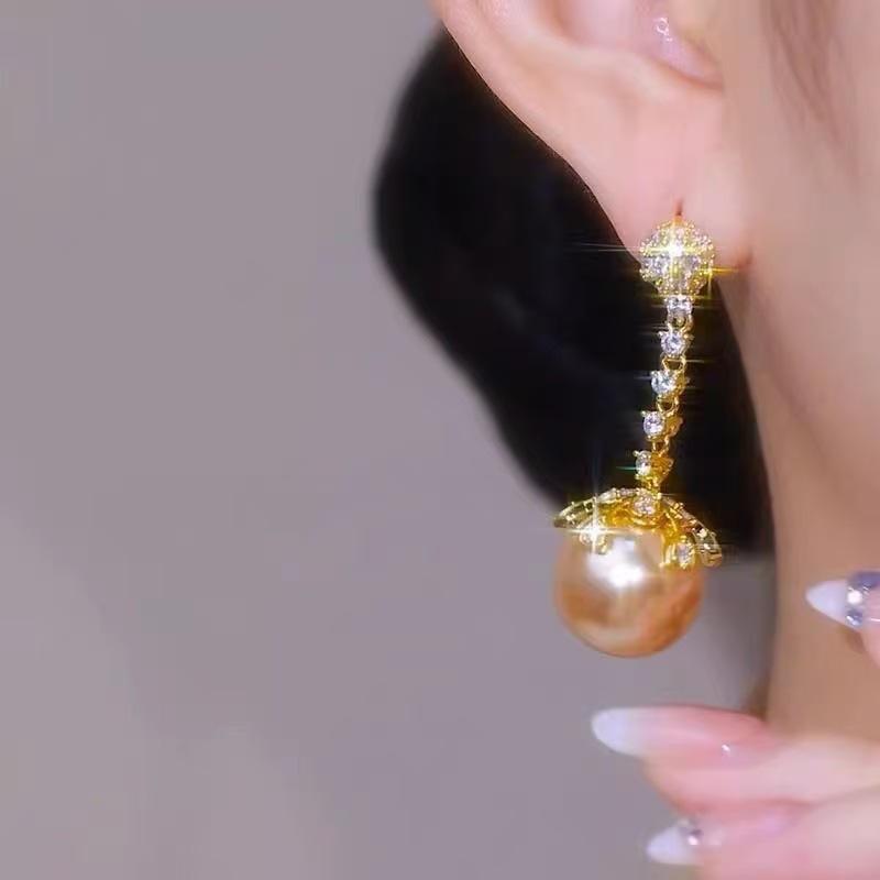 Korean version champagne pearl earrings, snowflake earrings, long temperament, high-end light luxury earrings, earrings.